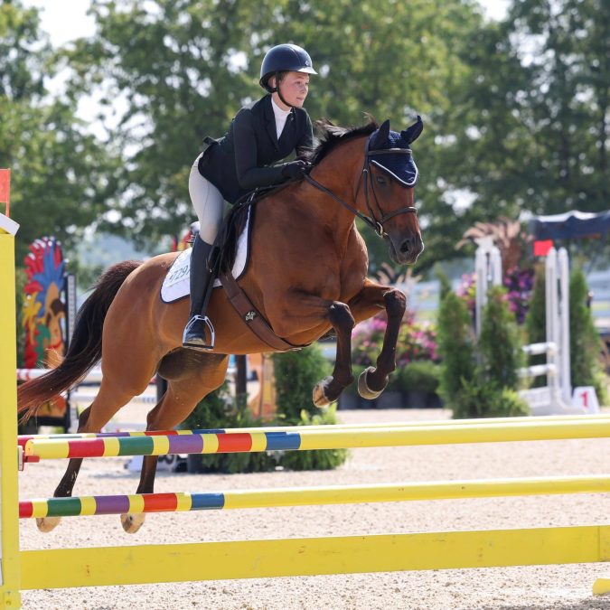 Avery Wismer jumping