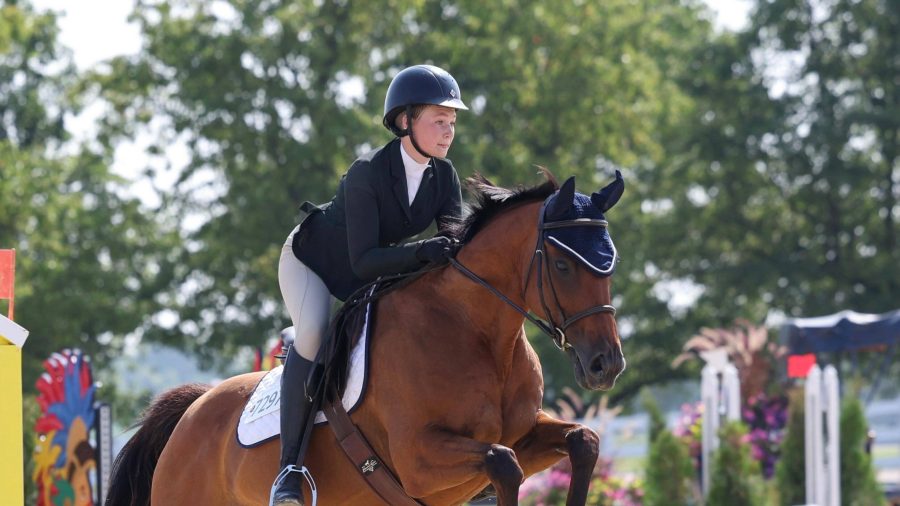 Avery Wismer jumping