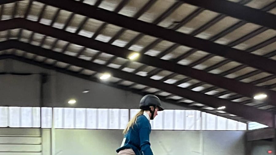Brooke Baker riding a horse